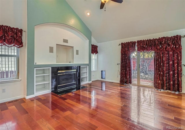 living room featuring hardwood / wood-style flooring and a wealth of natural light