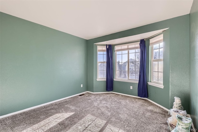 spare room with carpet flooring