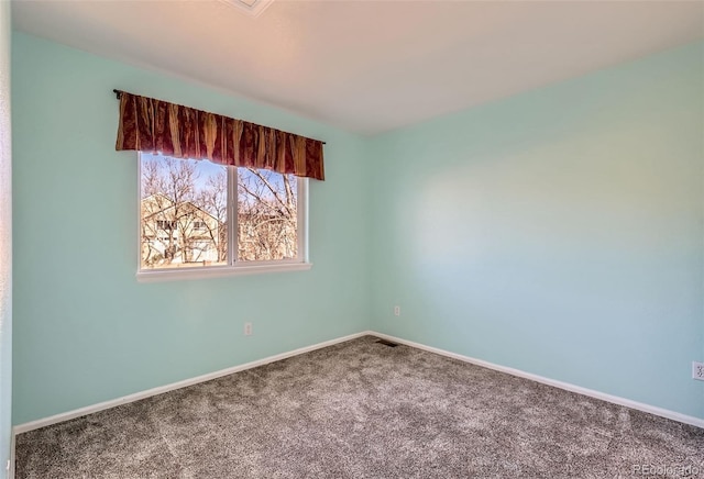 unfurnished room with carpet