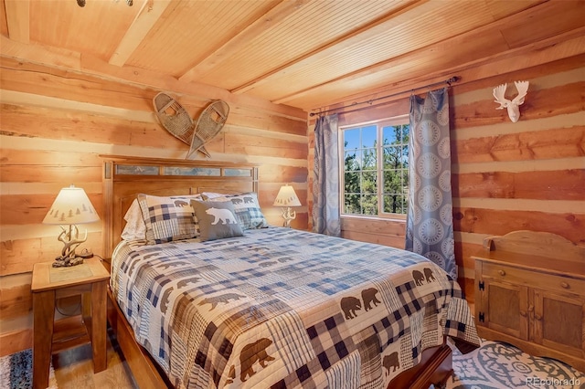 bedroom with wood-type flooring