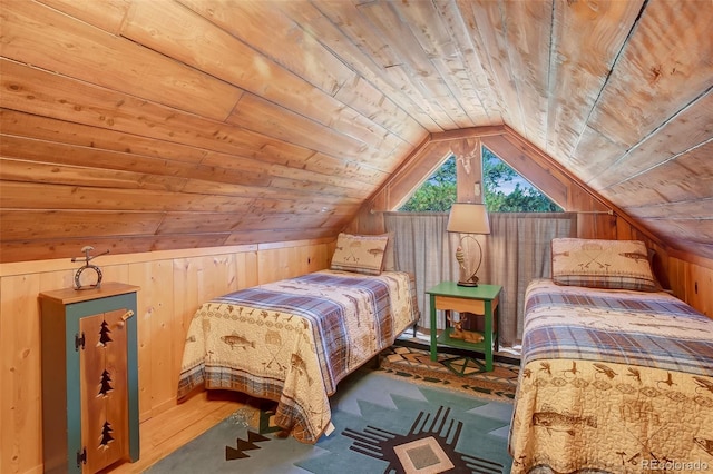 bedroom featuring wooden walls, lofted ceiling, and wood ceiling