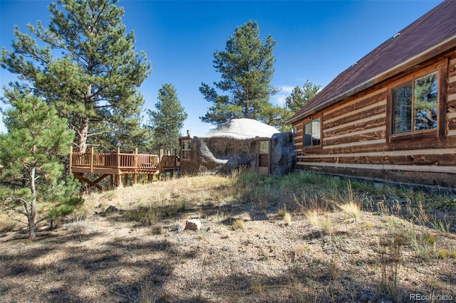 view of yard with a deck