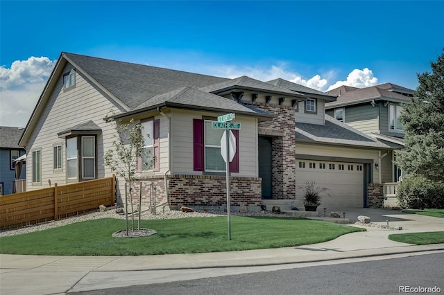 view of front of house with a garage and a front yard