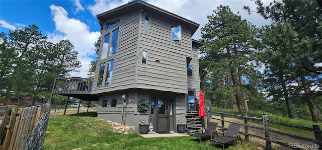 27901 Pine Dr, Evergreen, CO 80439 - rear view of house featuring a wooden deck and stairs