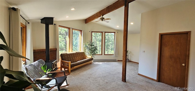 27901 Pine Dr, Evergreen, CO 80439 - sitting room with carpet flooring, ceiling fan, a baseboard radiator, recessed lighting, and a wood stove