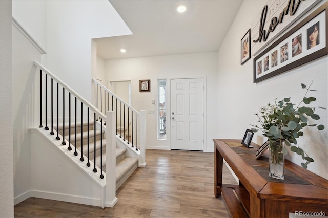 entryway with light hardwood / wood-style floors