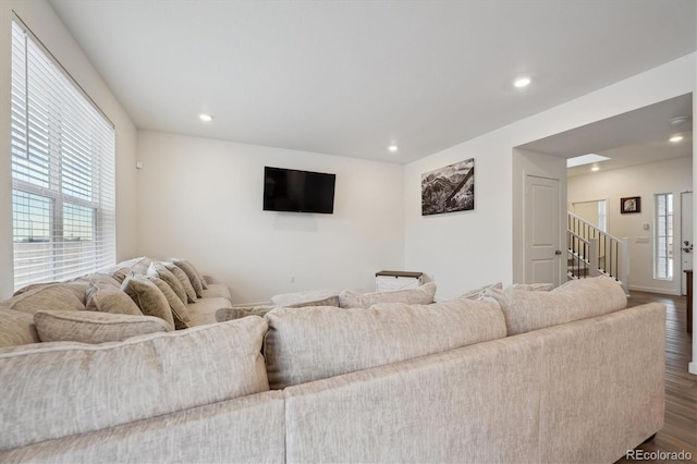 living room featuring dark hardwood / wood-style flooring