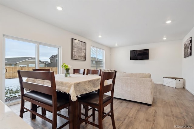 dining area featuring hardwood / wood-style floors