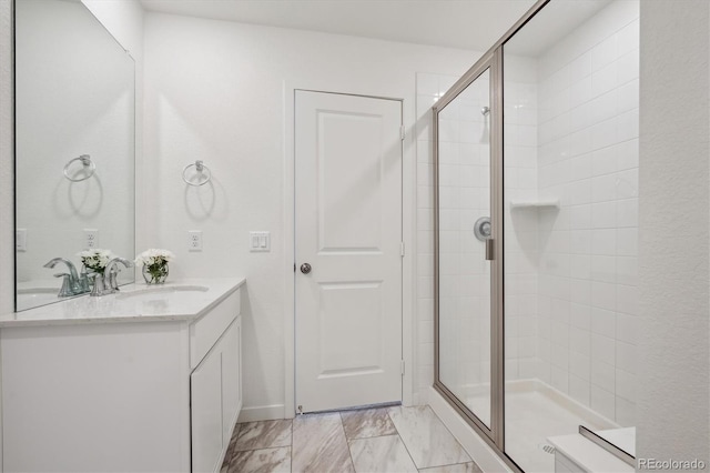 bathroom featuring vanity and walk in shower