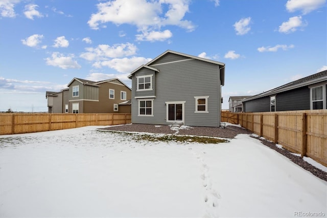 view of snow covered property