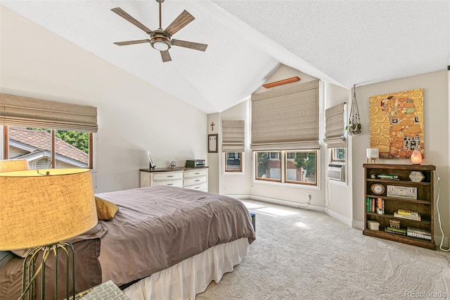 bedroom featuring ceiling fan, vaulted ceiling, light colored carpet, and multiple windows