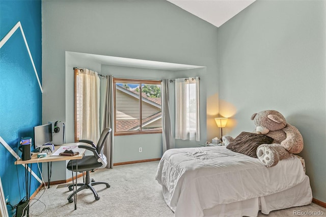 bedroom with carpet and vaulted ceiling