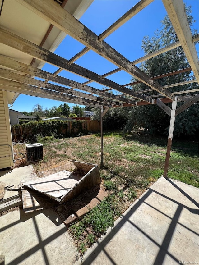 view of yard with a patio area and central AC unit