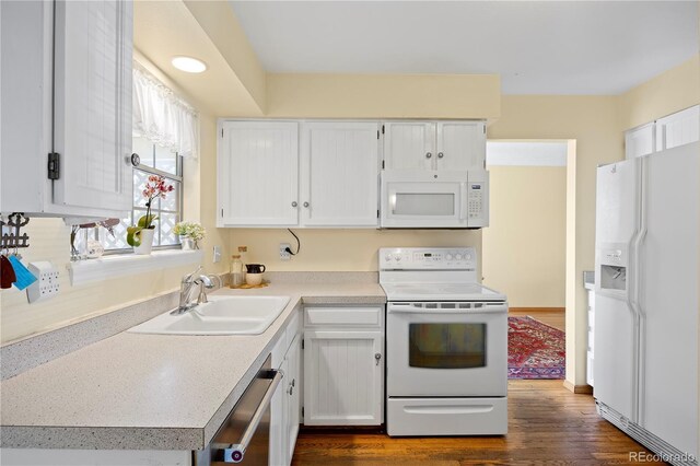 2608 E Fremont Pl, Centennial, CO 80122 - kitchen with white appliances, a sink, white cabinetry, dark wood-style floors, and light countertops