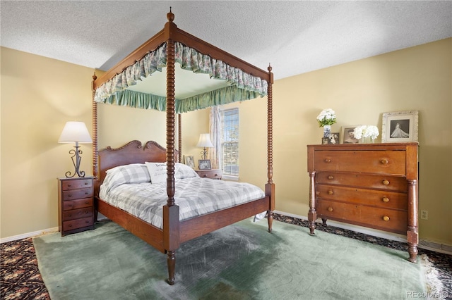 2608 E Fremont Pl, Centennial, CO 80122 - carpeted bedroom featuring baseboards and a textured ceiling