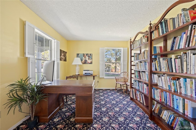 2608 E Fremont Pl, Centennial, CO 80122 - office area featuring a textured ceiling and baseboards