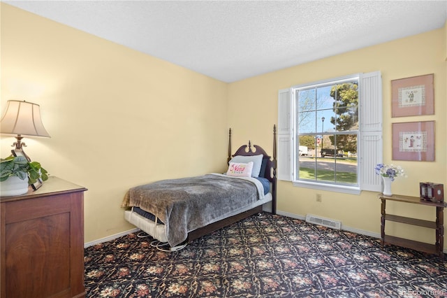 2608 E Fremont Pl, Centennial, CO 80122 - bedroom with baseboards and a textured ceiling