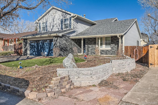 11759 E Asbury Ave, Aurora, CO 80014 - traditional-style home with covered porch, stone siding, a shingled roof, and a garage