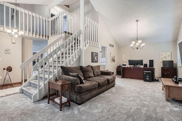 11759 E Asbury Ave, Aurora, CO 80014 - living room featuring a chandelier, high vaulted ceiling, carpet, stairs, and a textured ceiling