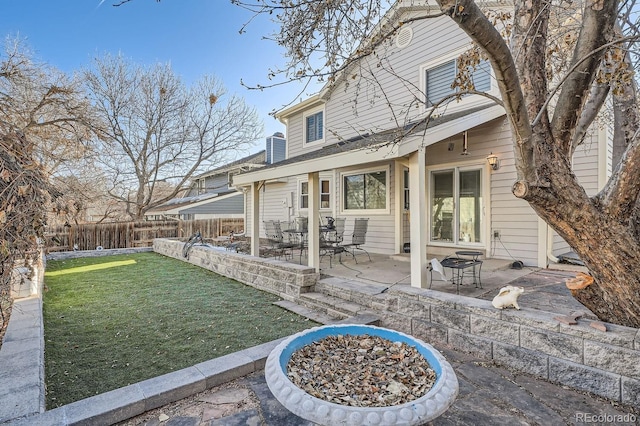 11759 E Asbury Ave, Aurora, CO 80014 - rear view of house featuring a patio