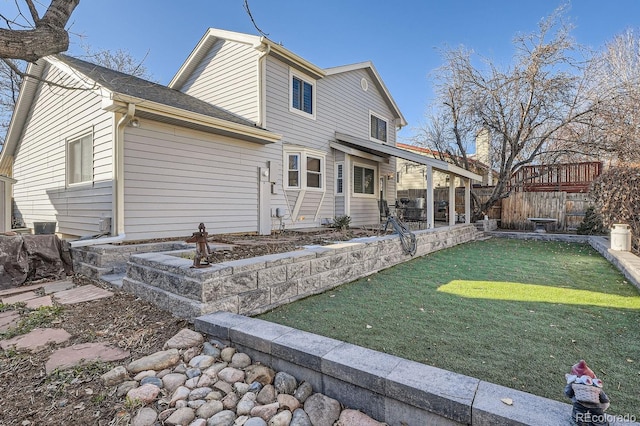 11759 E Asbury Ave, Aurora, CO 80014 - rear view of house featuring a patio