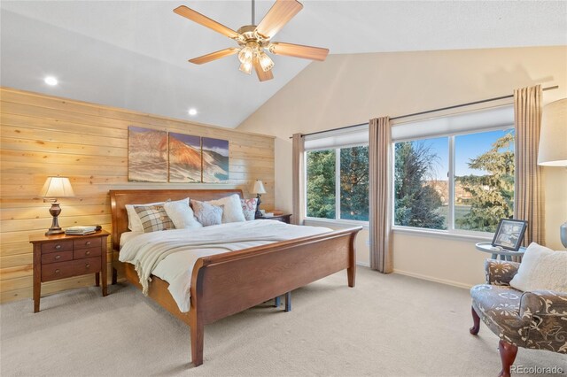 carpeted bedroom featuring wood walls, high vaulted ceiling, baseboards, and recessed lighting