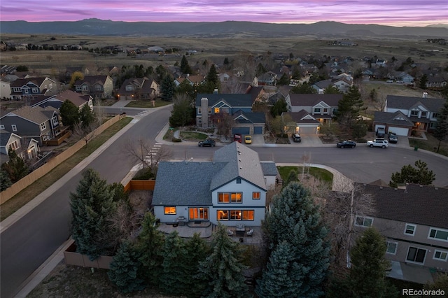 bird's eye view featuring a residential view and a mountain view