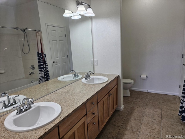 full bathroom with shower / bath combination with curtain, vanity, toilet, and tile patterned floors