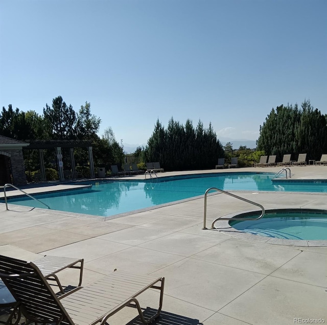 view of pool with a patio