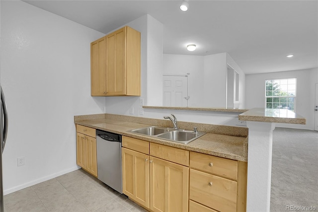 kitchen with dishwasher, sink, kitchen peninsula, light carpet, and light brown cabinets