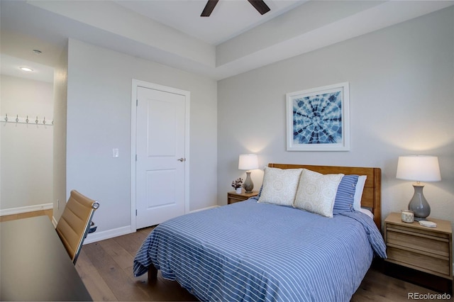 bedroom featuring hardwood / wood-style flooring and ceiling fan