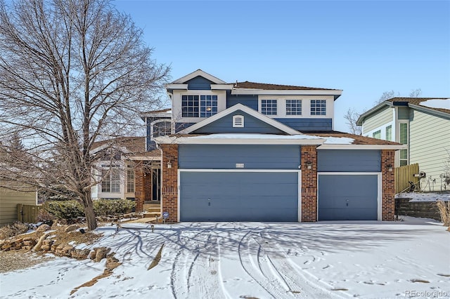 view of front facade featuring a garage and brick siding