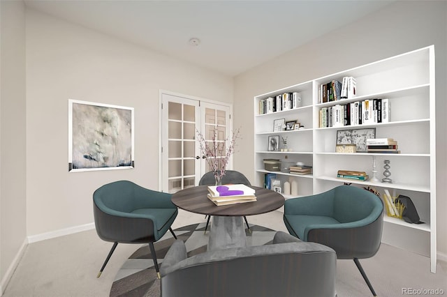 living area featuring carpet, french doors, and baseboards