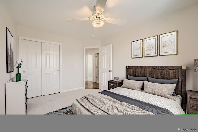 bedroom with carpet floors, a closet, a ceiling fan, and baseboards