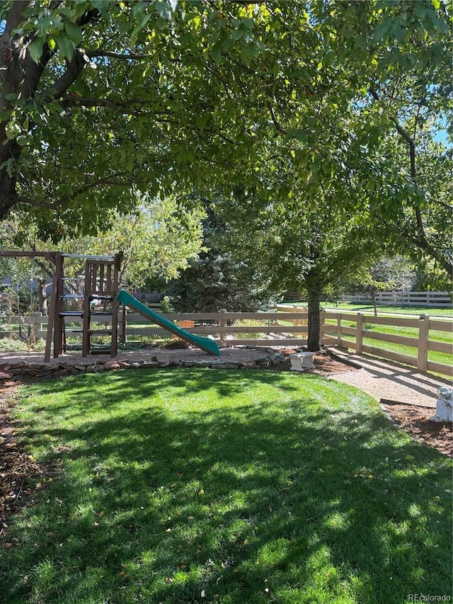 view of yard featuring fence