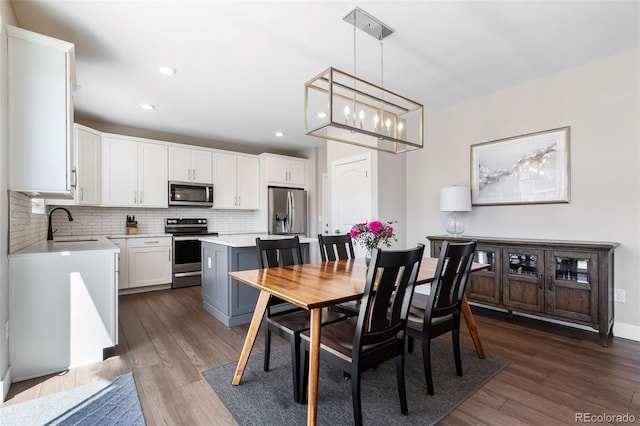 1632 Saddlesmith Pl, Castle Pines, CO 80108 - dining room featuring dark wood-style floors and recessed lighting