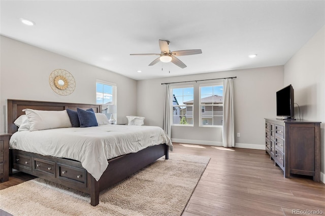 1632 Saddlesmith Pl, Castle Pines, CO 80108 - bedroom featuring wood finished floors, baseboards, recessed lighting, and ceiling fan