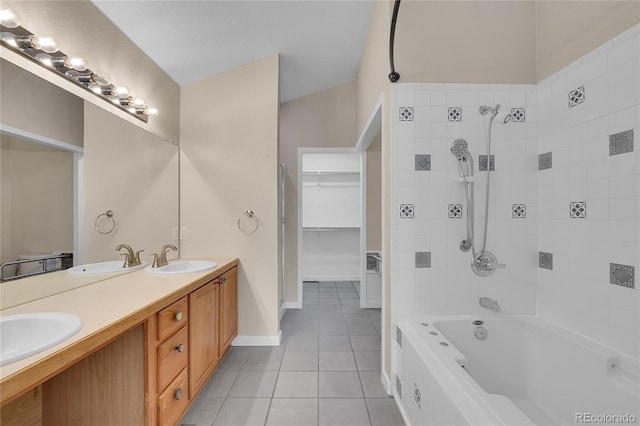 11268 Grove St Unit I, Westminster, CO 80031 - full bath featuring tile patterned floors, double vanity, bathtub / shower combination, and a spacious closet