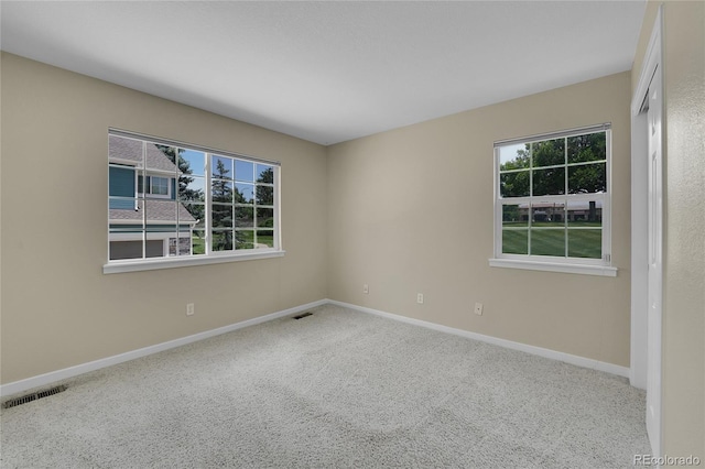 11268 Grove St Unit I, Westminster, CO 80031 - empty room featuring carpet flooring and baseboards