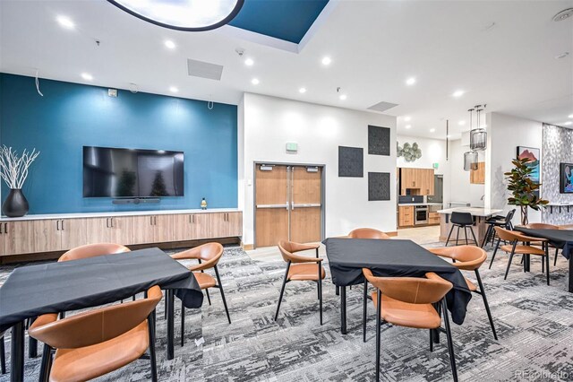 view of carpeted dining area