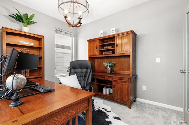 office space with light colored carpet and a notable chandelier