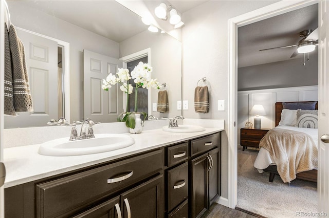 bathroom with vanity and ceiling fan