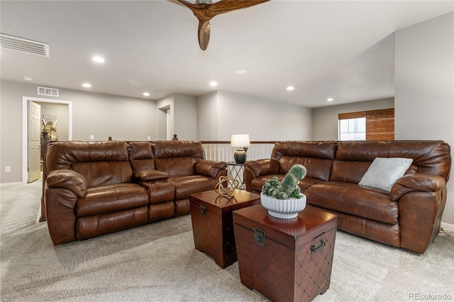 living room with light carpet, baseboards, visible vents, and recessed lighting