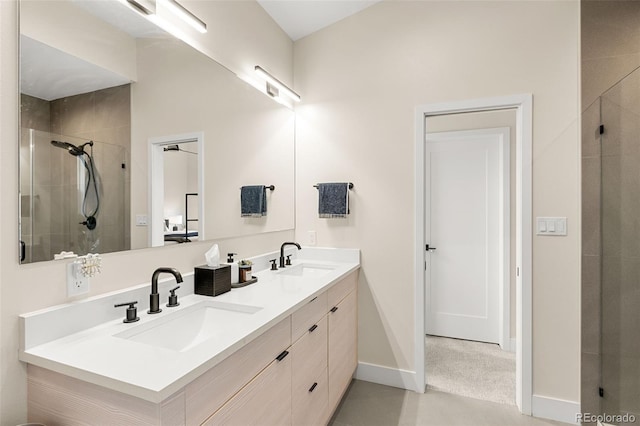 bathroom with vanity and walk in shower