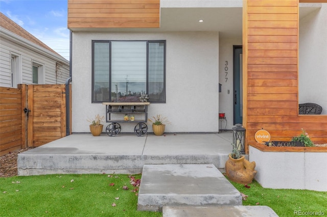 entrance to property with a porch