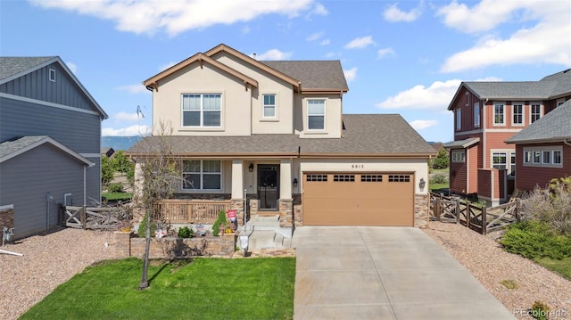 6612 Big Leaf Ln, Colorado Springs, CO 80927 - craftsman-style home featuring covered porch, an attached garage, concrete driveway, stucco siding, and stone siding
