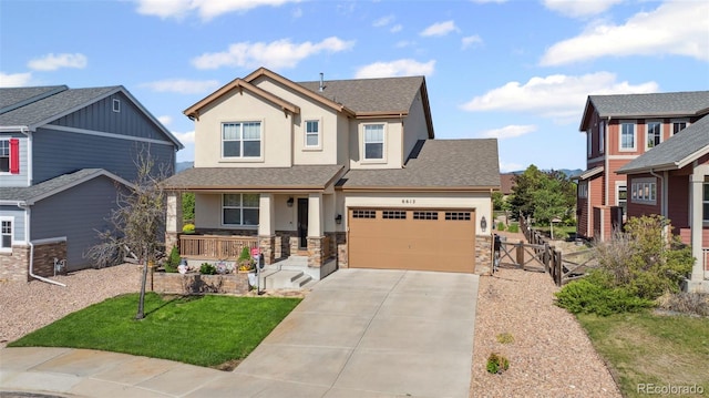 6612 Big Leaf Ln, Colorado Springs, CO 80927 - craftsman house with a porch, stucco siding, driveway, a gate, and stone siding