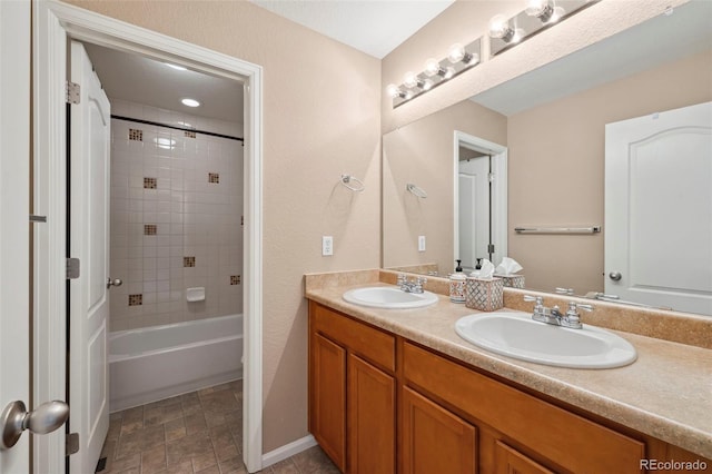 6612 Big Leaf Ln, Colorado Springs, CO 80927 - bathroom with double vanity and  shower combination