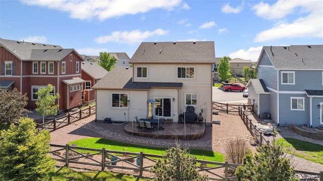 6612 Big Leaf Ln, Colorado Springs, CO 80927 - back of property featuring a residential view, stucco siding, a patio, and a fenced backyard