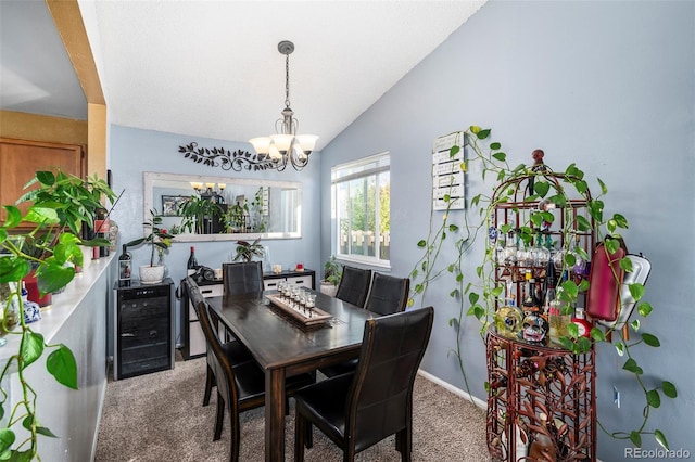 dining room featuring a notable chandelier, beverage cooler, vaulted ceiling, and carpet